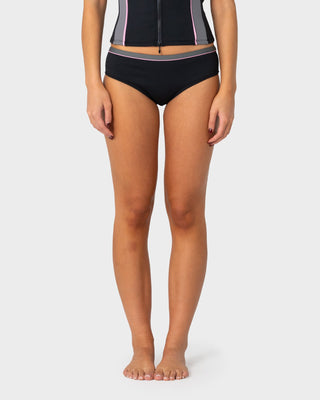 Woman wearing Farrah Booty Bikini Bottom in Black / Pink
