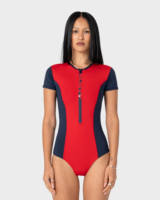 woman-wearing-dirt-rider-s-s-surf-suit-in-red-navy