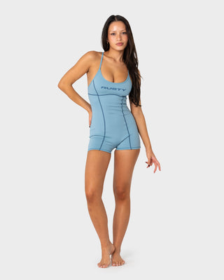 Woman wearing Low-key Romper One Piece in Smoke Blue