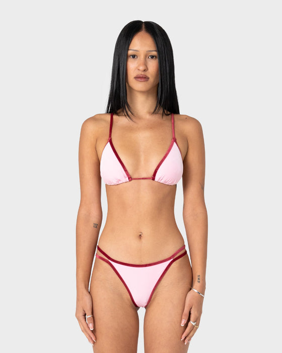 woman-wearing-sugary-sliding-tri-bikini-top-in-pink-red