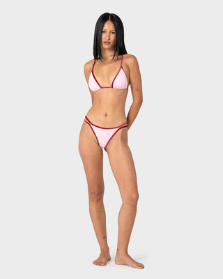 woman-wearing-sugary-brazilian-bikini-bottom-in-pink-red