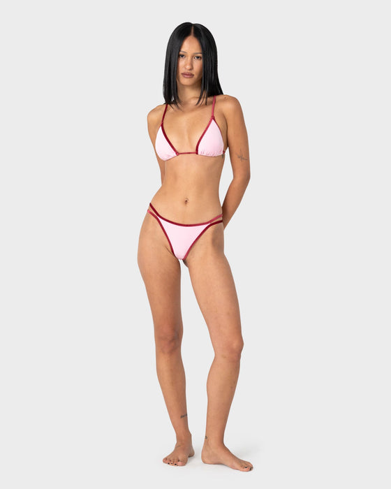 woman-wearing-sugary-brazilian-bikini-bottom-in-pink-red