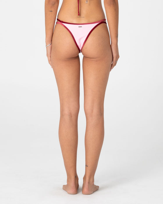 woman-wearing-sugary-brazilian-bikini-bottom-in-pink-red