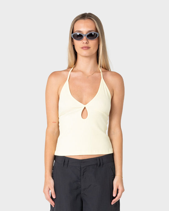 woman-wearing-emma-cut-out-skimmer-tank-in-pale-banana