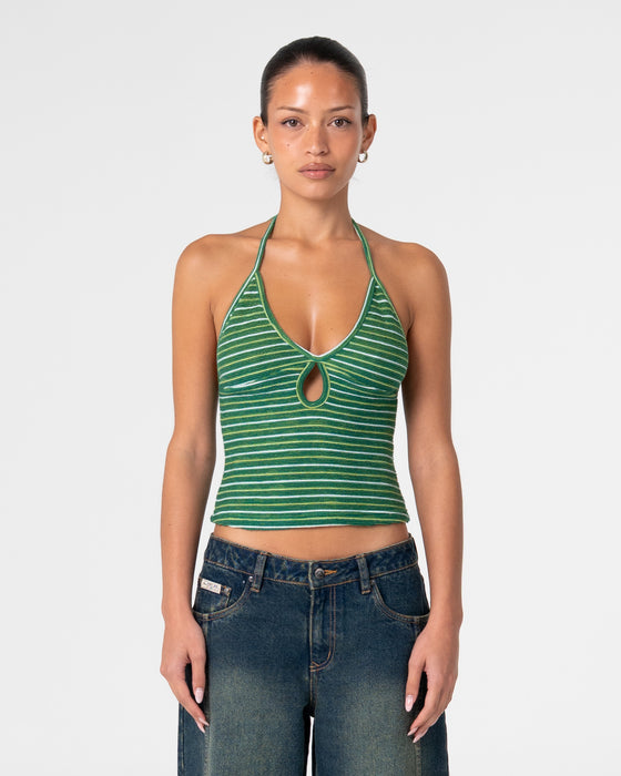 woman-wearing-emma-cut-out-skimmer-tank-in-tonal-green-stripe