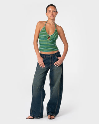 Woman wearing Emma Cut Out Skimmer Tank in Tonal Green Stripe