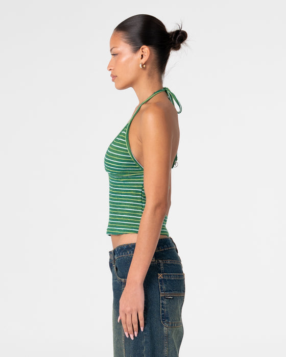 woman-wearing-emma-cut-out-skimmer-tank-in-tonal-green-stripe