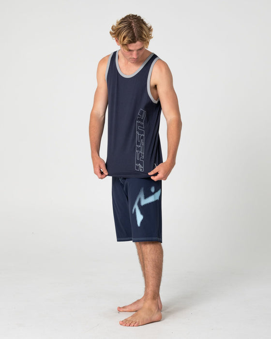 man-wearing-speedrun-tank-in-navy-blue
