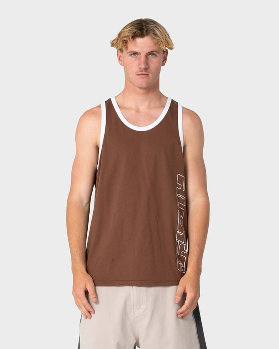 man-wearing-speedrun-tank-in-pinecone