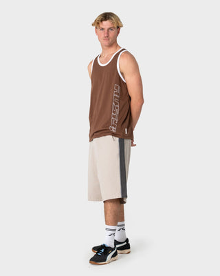 Man wearing Speedrun Tank in Pinecone