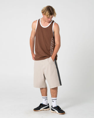 Man wearing Speedrun Tank in Pinecone
