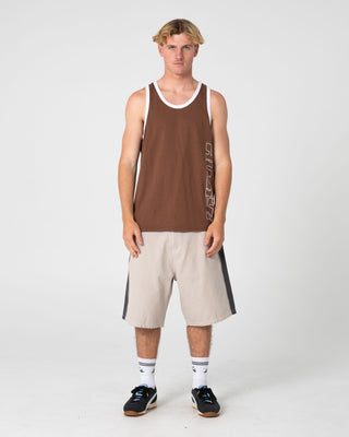 Man wearing Speedrun Tank in Pinecone