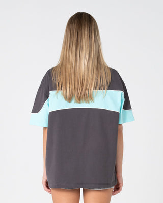 Woman wearing Kinetic Oversize Tee in Carbon / Aqua