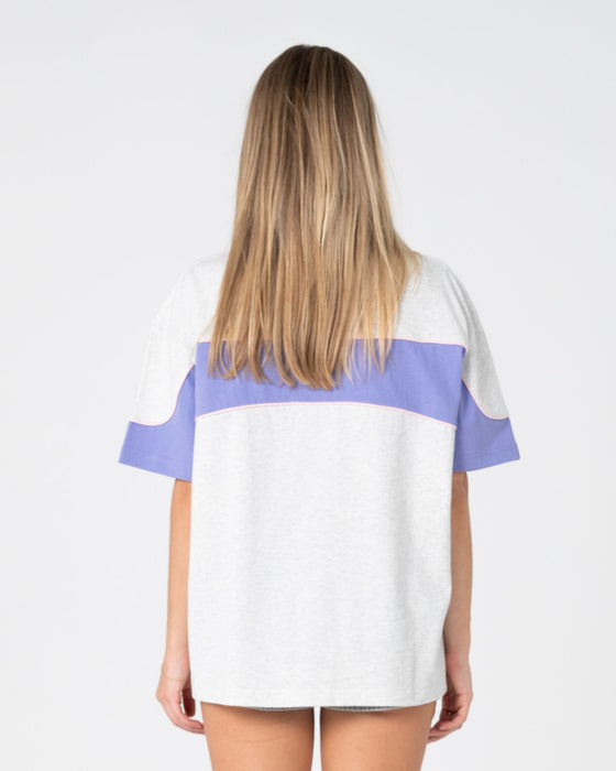 woman-wearing-kinetic-oversize-tee-in-grey-marle-mulberry-purple