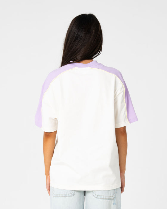 woman-wearing-timmy-target-220-oversize-tee-in-cream-mulberry-purple