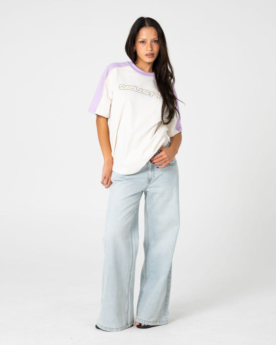 woman-wearing-timmy-target-220-oversize-tee-in-cream-mulberry-purple