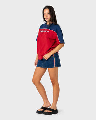 Woman wearing Archived Ops Oversize Short Sleeve Tee in Cranberry / Navy