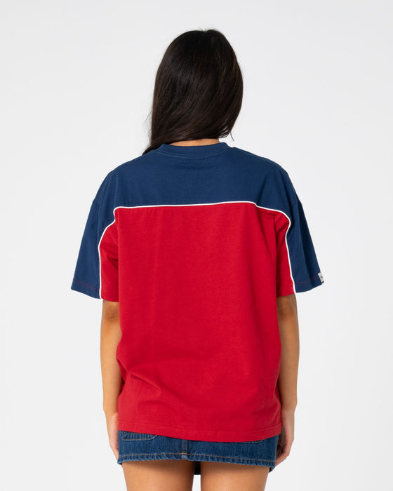 woman-wearing-archived-ops-oversize-short-sleeve-tee-in-cranberry-navy