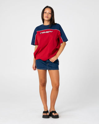 Woman wearing Archived Ops Oversize Short Sleeve Tee in Cranberry / Navy