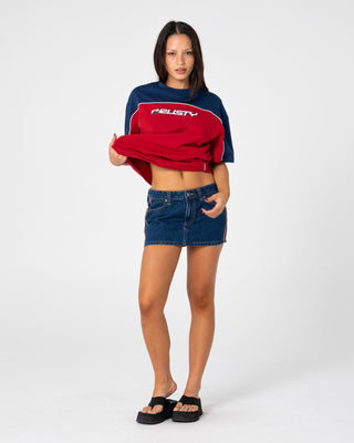 Woman wearing Archived Ops Oversize Short Sleeve Tee in Cranberry / Navy