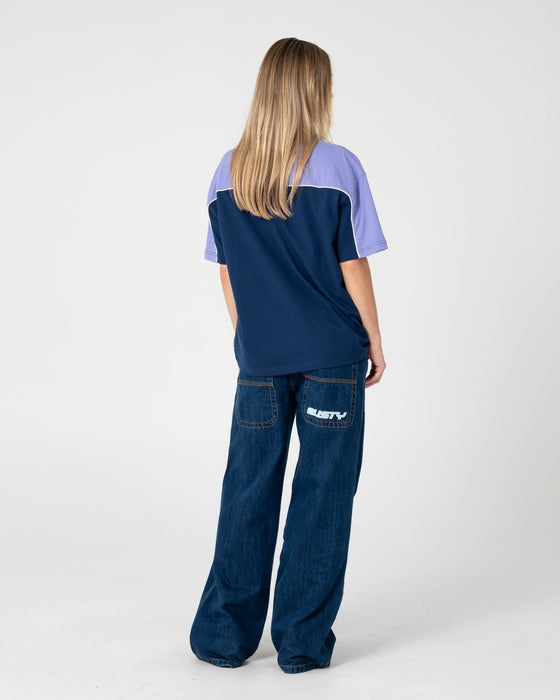 woman-wearing-archived-ops-oversize-short-sleeve-tee-in-navy-mulberry-purple