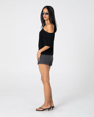 Woman wearing Sally Slouch Off Shoulder Tee in Black