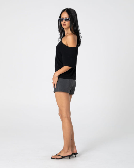 woman-wearing-sally-slouch-off-shoulder-tee-in-black