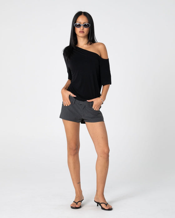 woman-wearing-sally-slouch-off-shoulder-tee-in-black