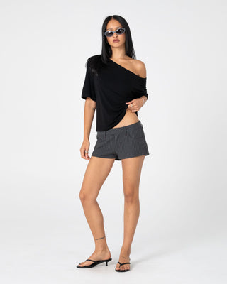 Woman wearing Sally Slouch Off Shoulder Tee in Black
