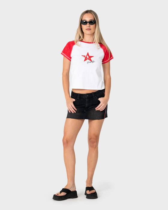 woman-wearing-starred-devil-raglan-baby-tee-in-white-red
