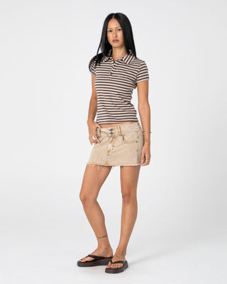 Woman wearing Peta Stripe Polo Baby Tee in Brown / Cream Stripe