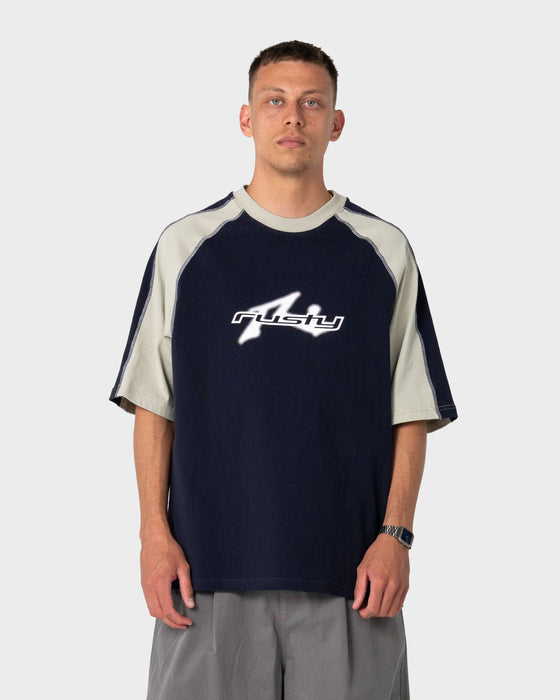 man-wearing-fade-r-short-sleeve-tee-in-navy-blue