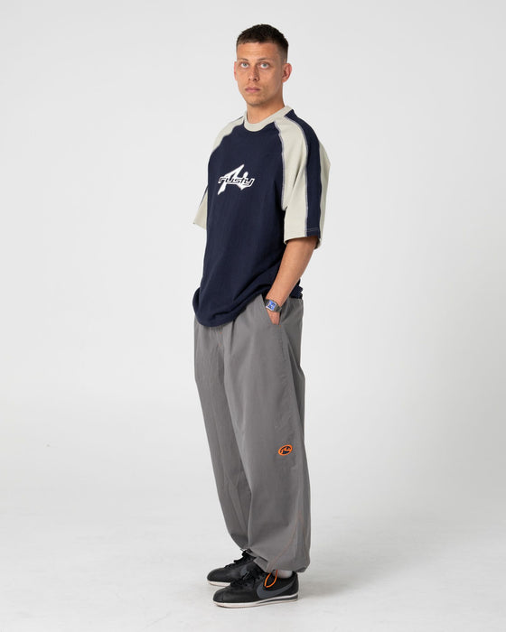 man-wearing-fade-r-short-sleeve-tee-in-navy-blue