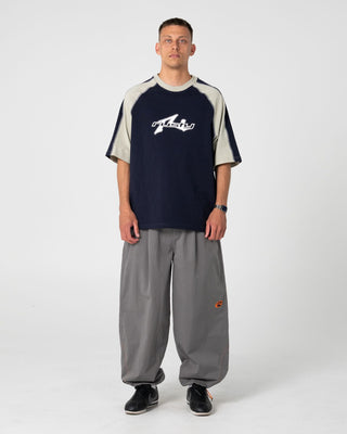 Man wearing Fade-r Short Sleeve Tee in Navy Blue