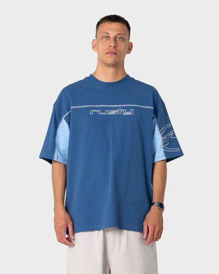 Man wearing Cyberwave Short Sleeve Tee in Atlantic Blue