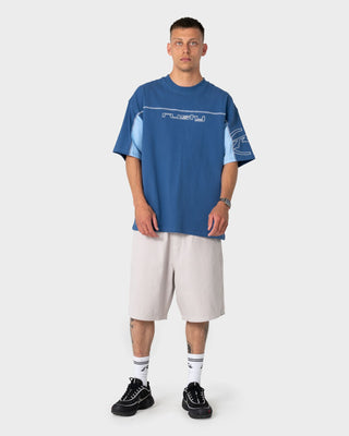 Man wearing Cyberwave Short Sleeve Tee in Atlantic Blue