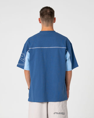 Man wearing Cyberwave Short Sleeve Tee in Atlantic Blue