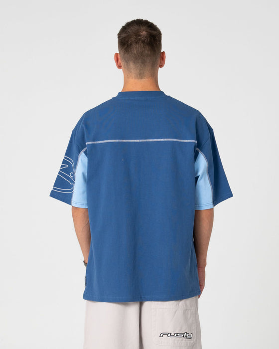 man-wearing-cyberwave-short-sleeve-tee-in-atlantic-blue