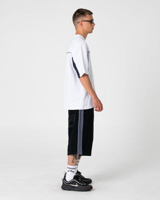 Man wearing Cyberwave Short Sleeve Tee in Ecru Marle