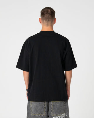 Man wearing Dr. Dot Short Sleeve Tee in Black