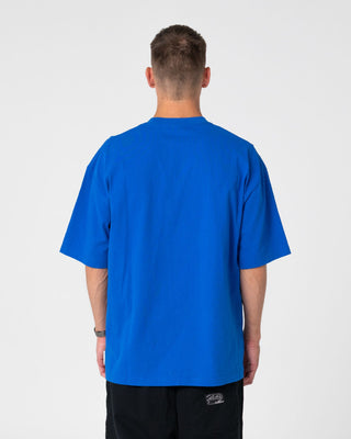 Man wearing Dr. Dot Short Sleeve Tee in Royal Blue