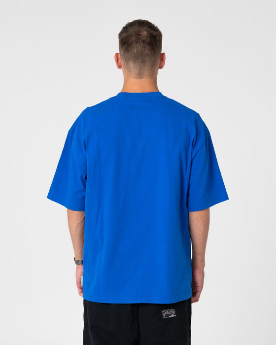 man-wearing-dr-dot-short-sleeve-tee-in-royal-blue
