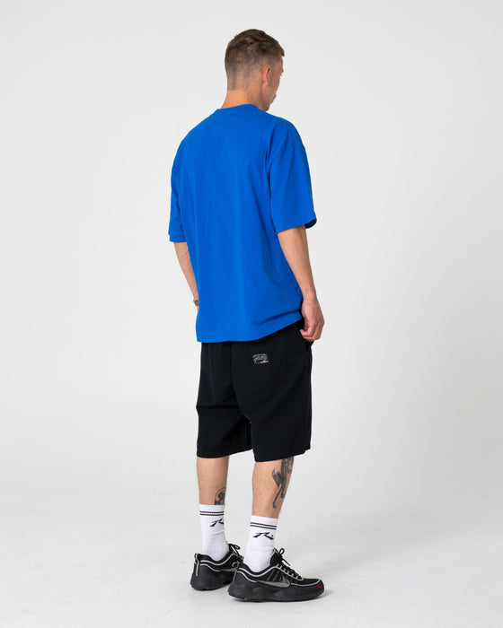 man-wearing-dr-dot-short-sleeve-tee-in-royal-blue