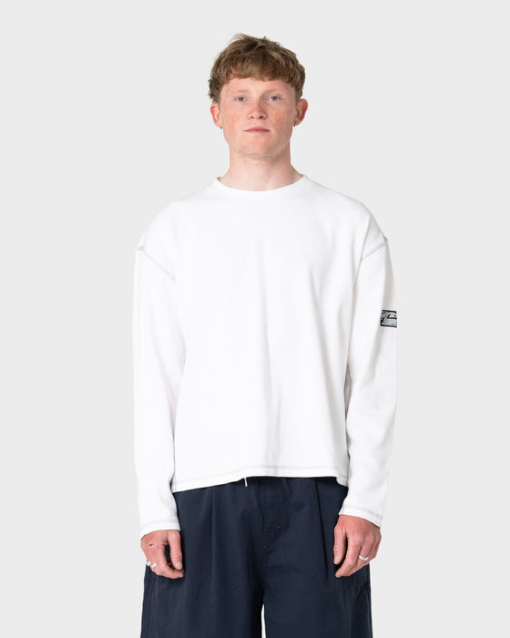 man-wearing-slack-jack-long-sleeve-heavy-tee-in-white