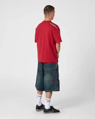 Man wearing Razor Short Sleeve Tee in Vintage Red