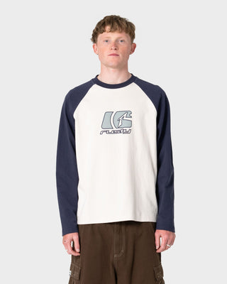 Man wearing Watto Long Sleeve Heavy Tee in Cream