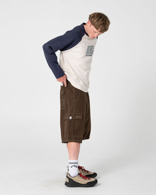 Man wearing Watto Long Sleeve Heavy Tee in Cream