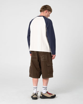 Man wearing Watto Long Sleeve Heavy Tee in Cream