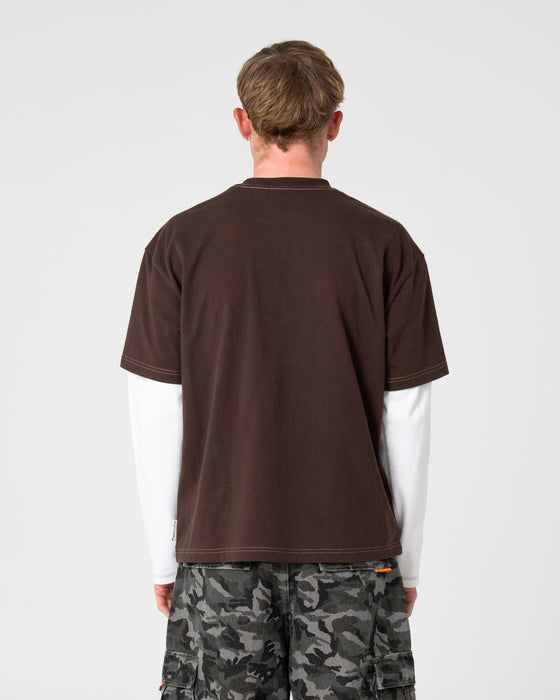 man-wearing-morning-glory-short-sleeve-tee-in-java