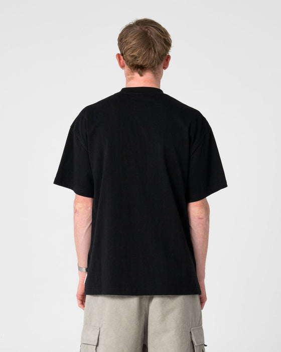 man-wearing-fragment-short-sleeve-tee-in-black